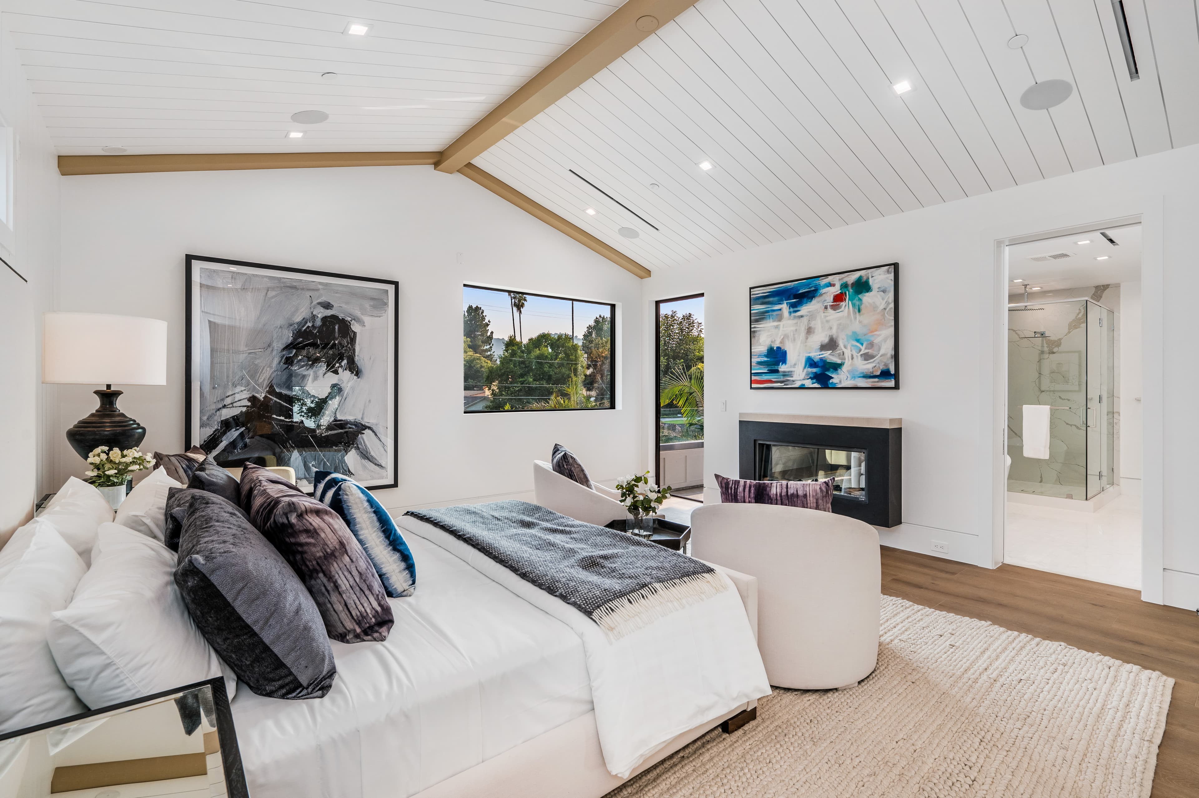Interior design Sydney: bedroom styling with layered textiles and abstract artwork (placeholder)