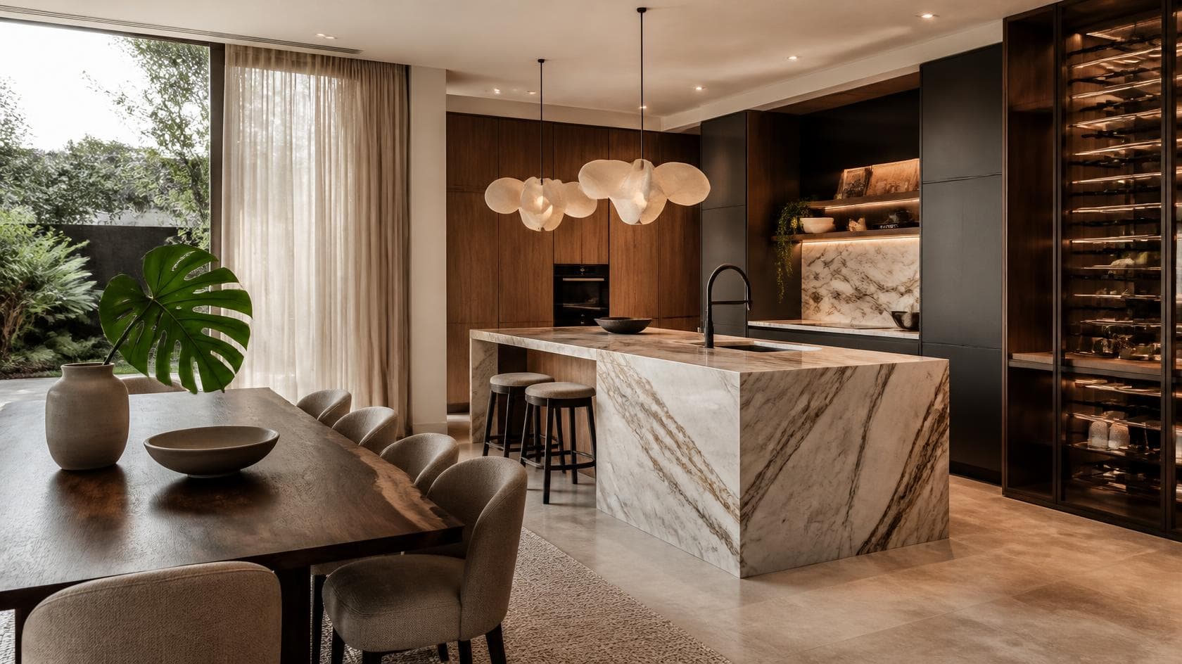 Interior design Sydney: kitchen with matte charcoal cabinetry and a marble benchtop